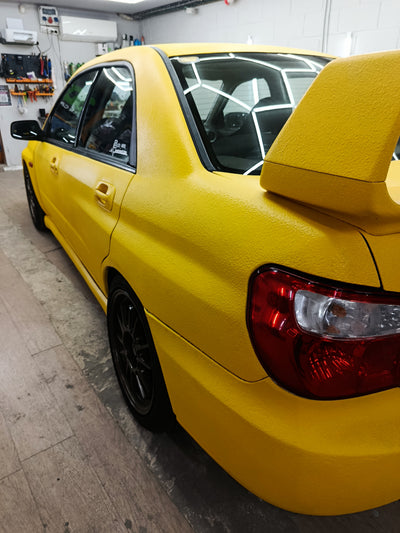 Subaru WRX yellow raptor