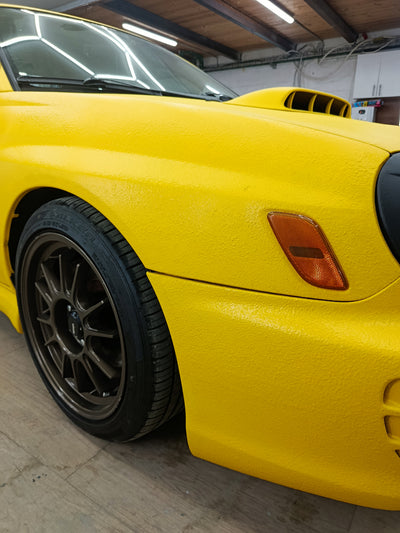 Subaru WRX yellow raptor