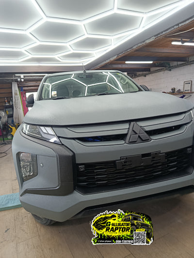 Mitsubishi Triton gray raptor