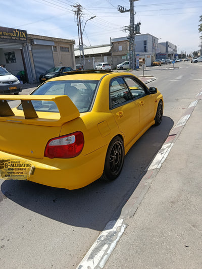 Subaru WRX yellow raptor