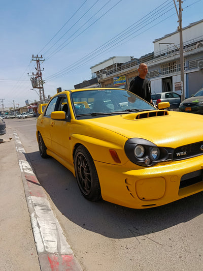 Subaru WRX yellow raptor