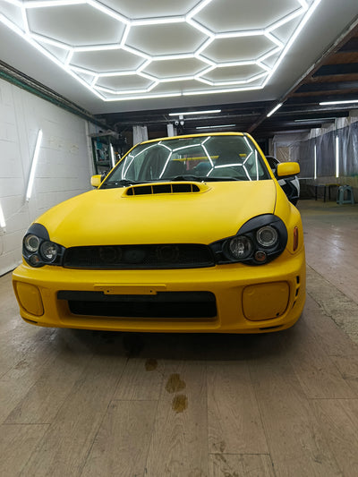 Subaru WRX yellow raptor