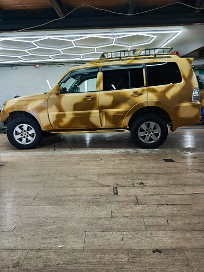 Mitsubishi Pajero desert camouflage raptor
