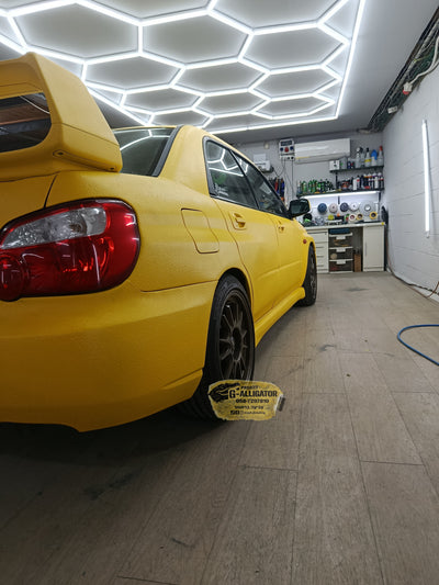 Subaru WRX yellow raptor